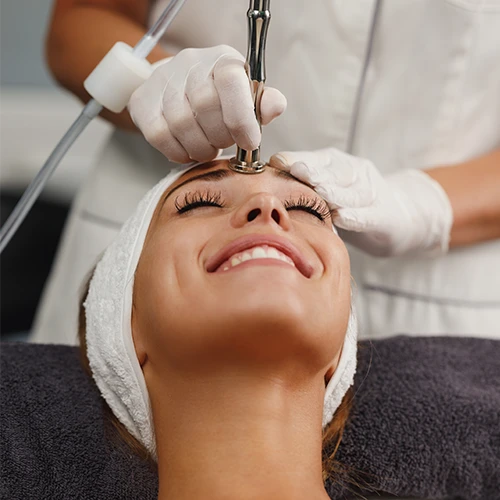 CARE Esthetics facial treatment being performed
